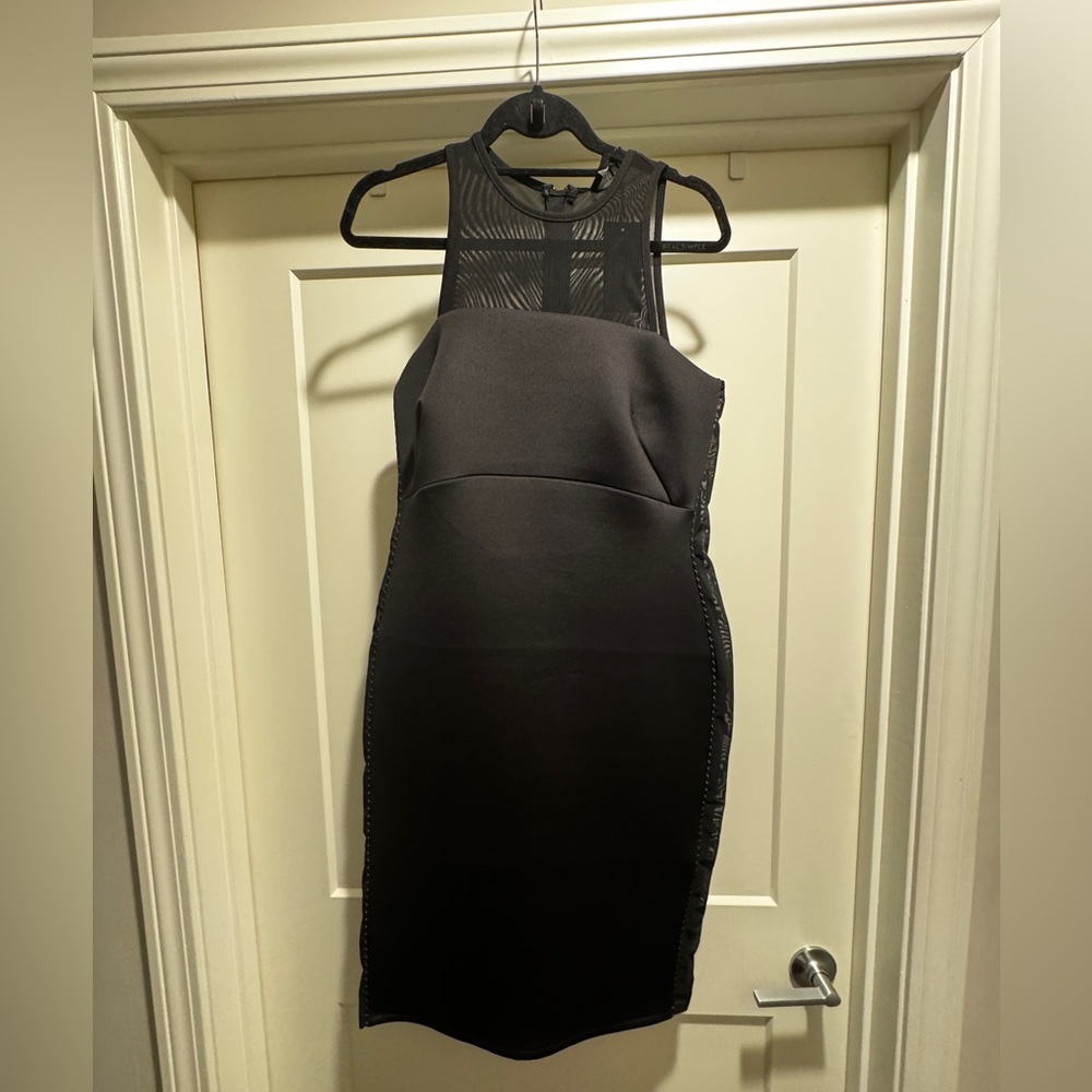 Sexy Black Dress with mesh side panels & partial back!